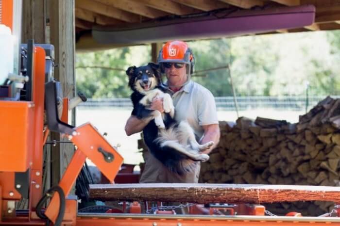 Mike Walkup with man's best friend, cutting boards