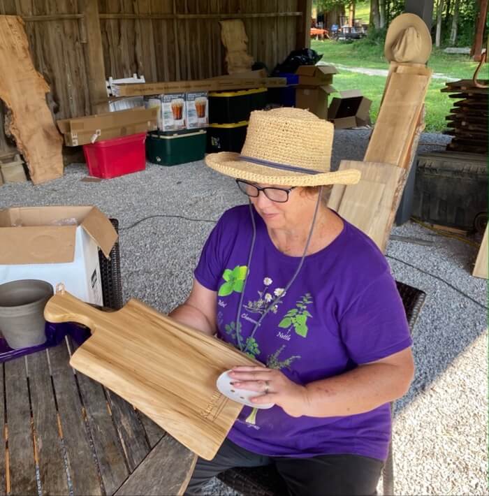 Karen Walkup with final sanding