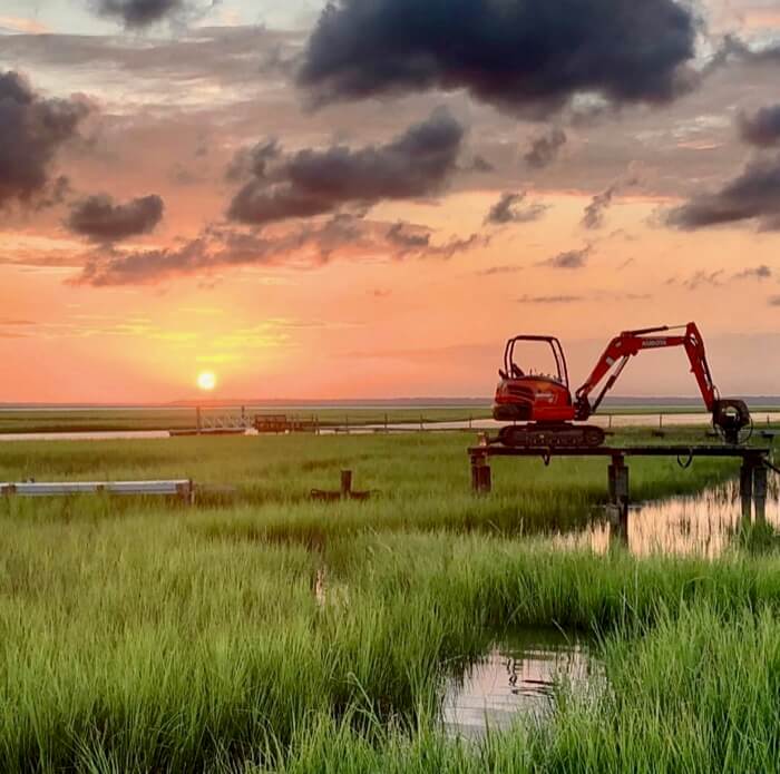 Nature and machine juxtaposition photo by Kathy Miller